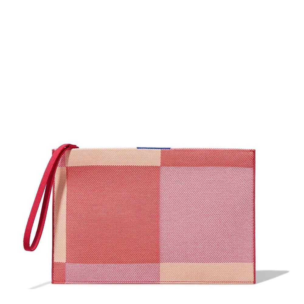 🍑 ISO- Rothy’s peach madras essential pouch 🍑